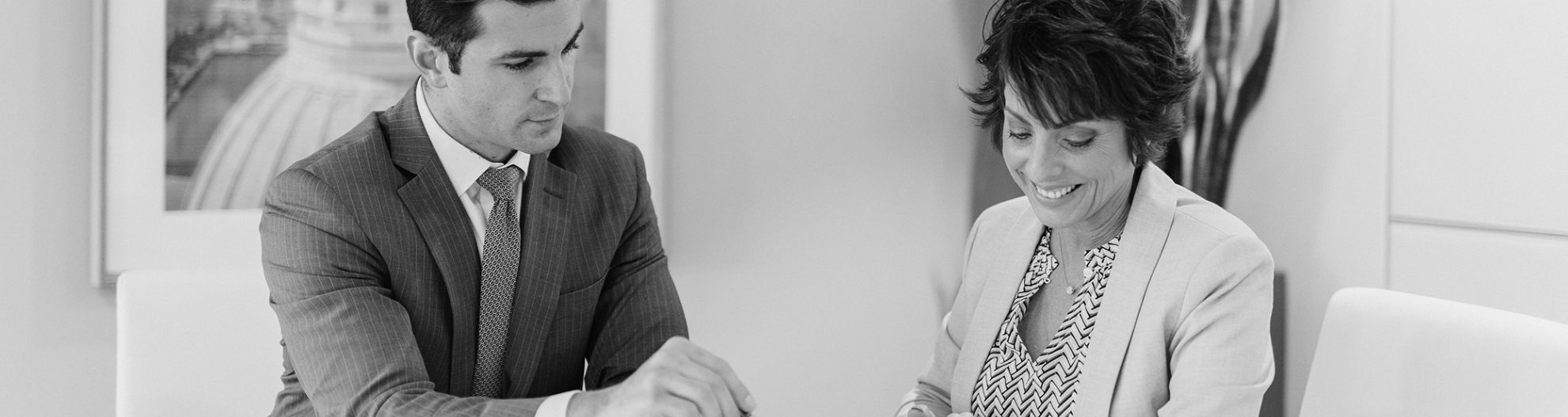 Tommy Valenza and Tina Chowning reviewing documents